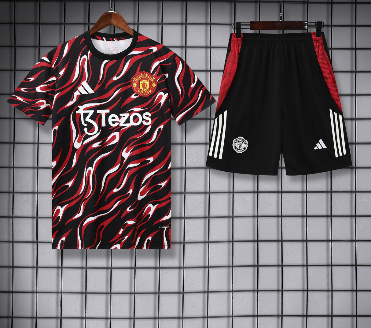 KIT MAGLIA+PANTALONCINO MANCHESTER UNITED