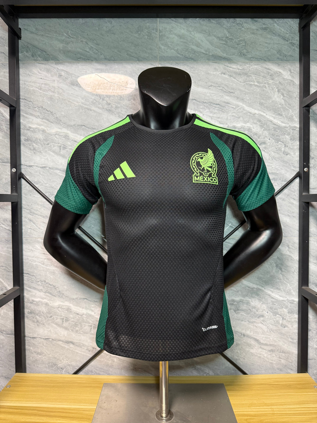 MEXICO 2026/27 OPVARMNINGSTRØJE - Sort, Grøn, Spillerversion
