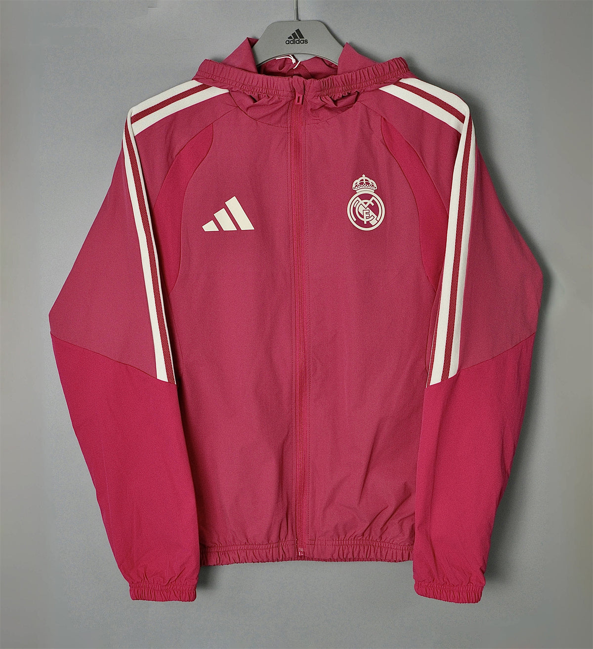 REAL MADRID 2026/27 HOODED WINDBREAKER JACKET - Rose Pink/White Stripes - front