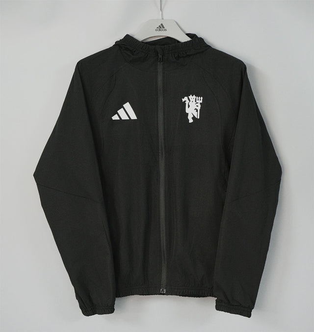 MANCHESTER UNITED 2026/27 HOODED WINDBREAKER JACKET - Black - front