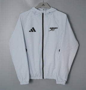 ARSENAL 2026/27 HOODED WINDBREAKER JACKET - Light Grey - front