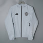 MANCHESTER UNITED 2026/27 HOODED WINDBREAKER JACKET - Light Grey - front