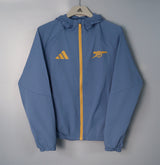 ARSENAL 2026/27 HOODED WINDBREAKER JACKET - Blue Grey - front