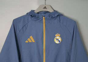 REAL MADRID 2026/27 HOODED WINDBREAKER JACKET - Blue Grey - front
