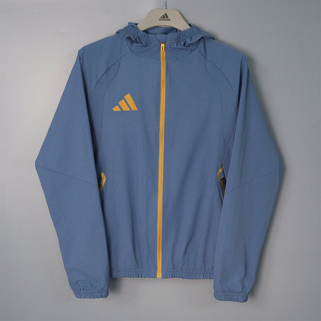 ADIDAS 2026/27 CORTAVIENTOS CON CAPUCHA - Gris Azulado