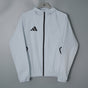 ADIDAS 2026/27 HOODED WINDBREAKER JACKET - Light Grey - front